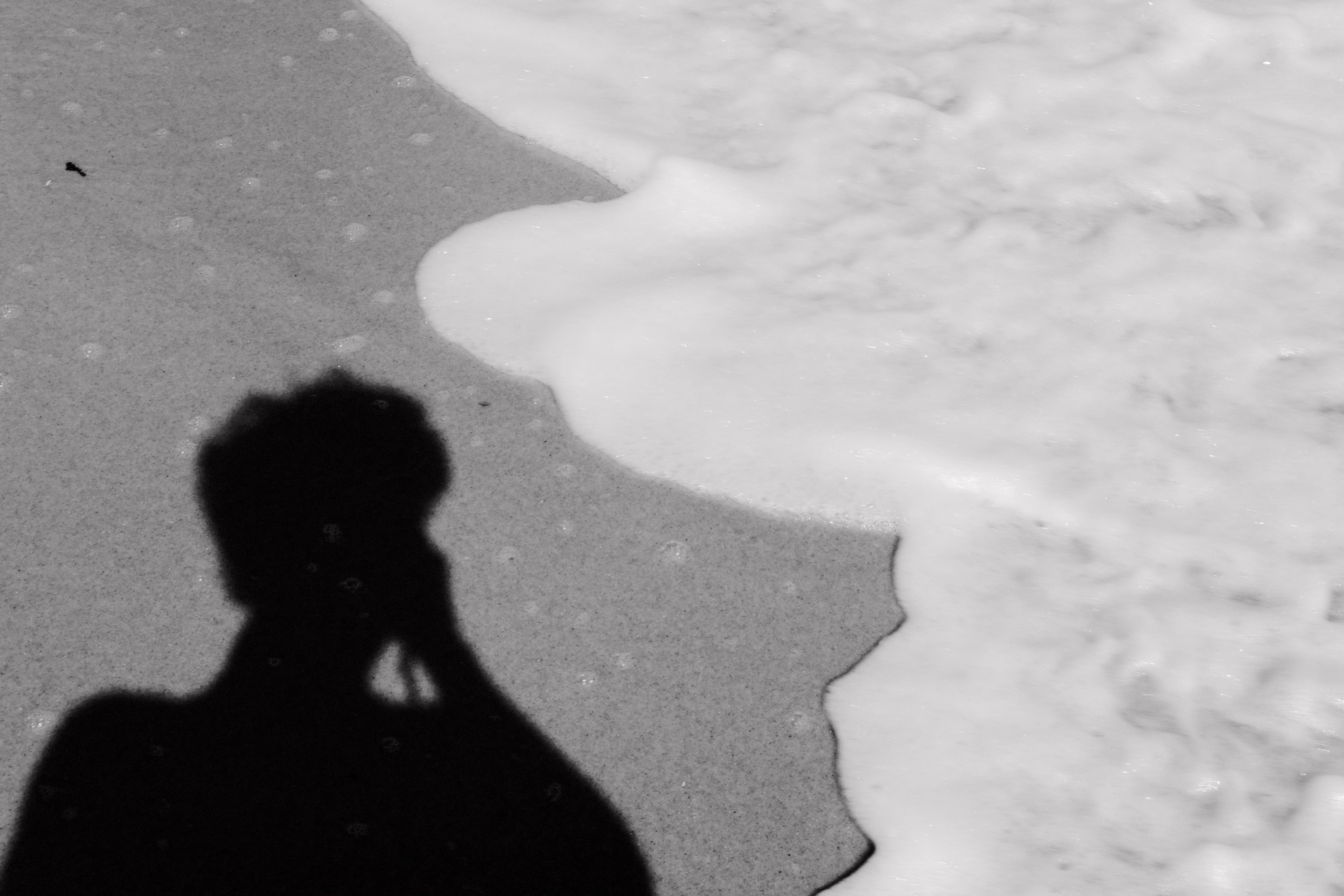 black and white shadow on beach
